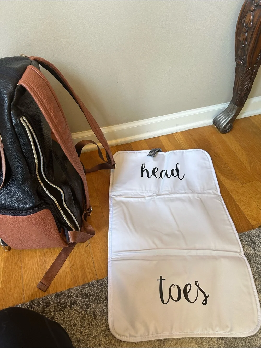 Itzy Ritzy Herringbone Baby Backpack in Black, White & Brown